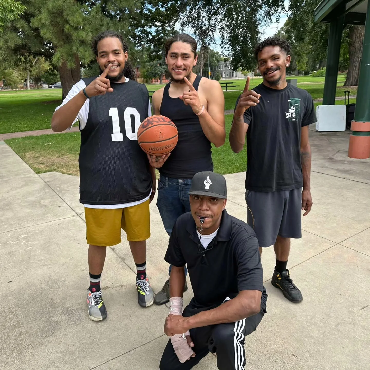 A MACM team photo with basketball in a park
